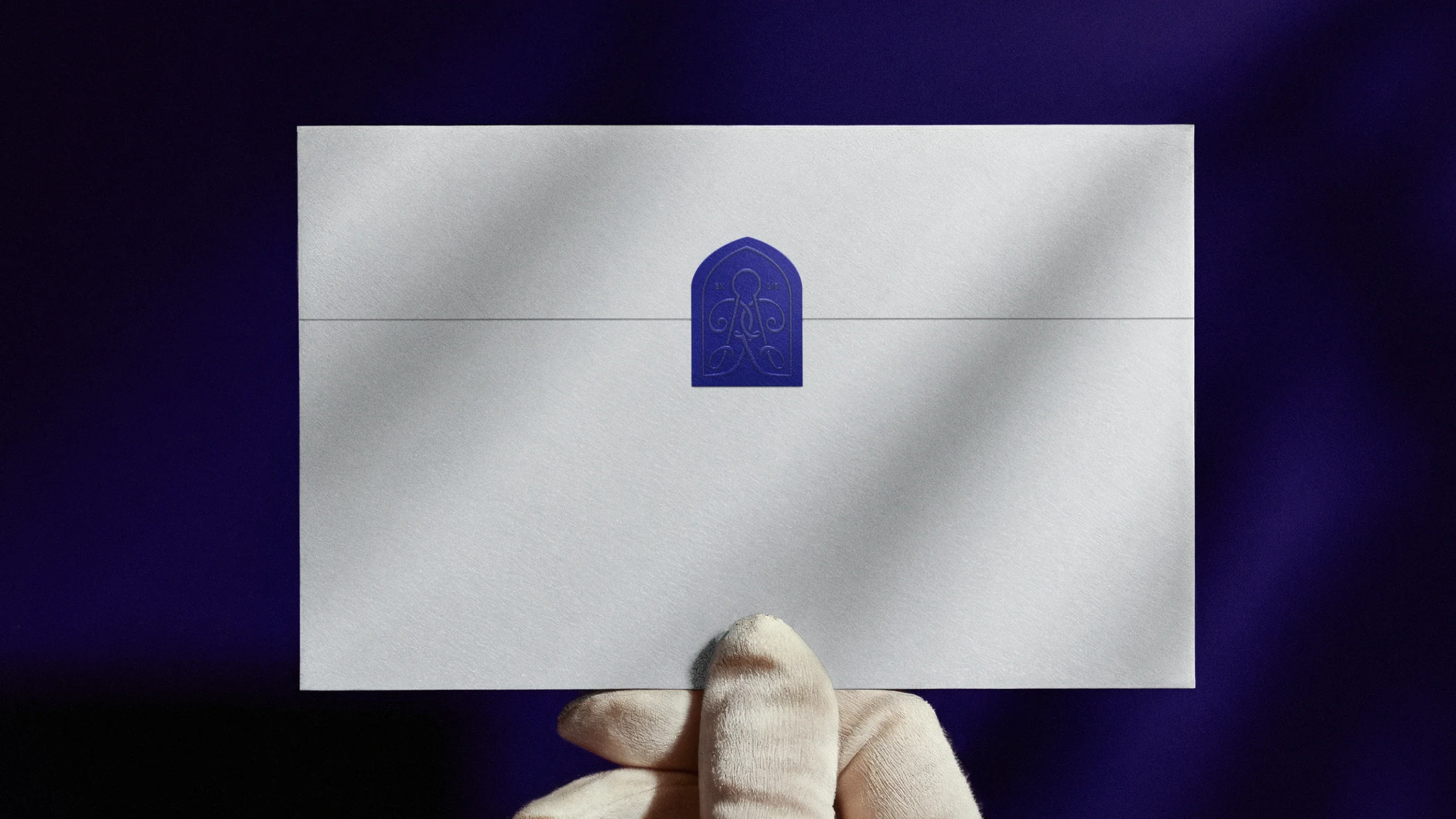 Rudin envelope sealed with branded sticker