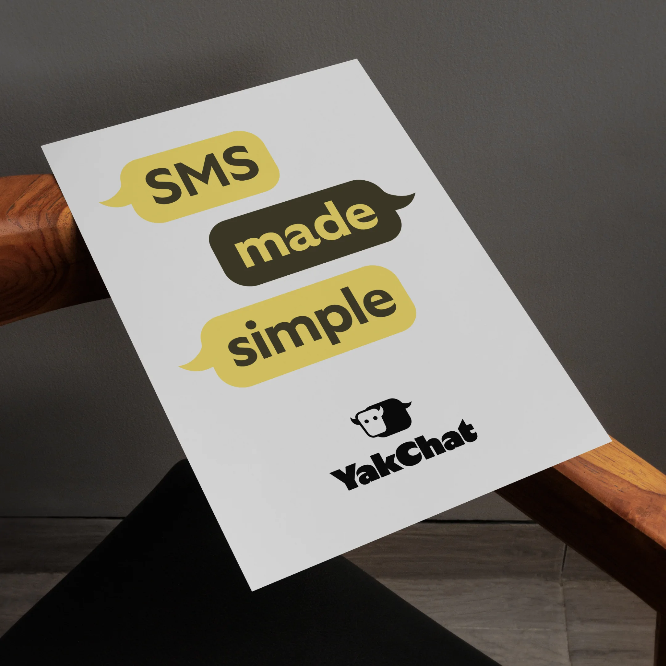 YakChat printed brand card reading SMS made simple