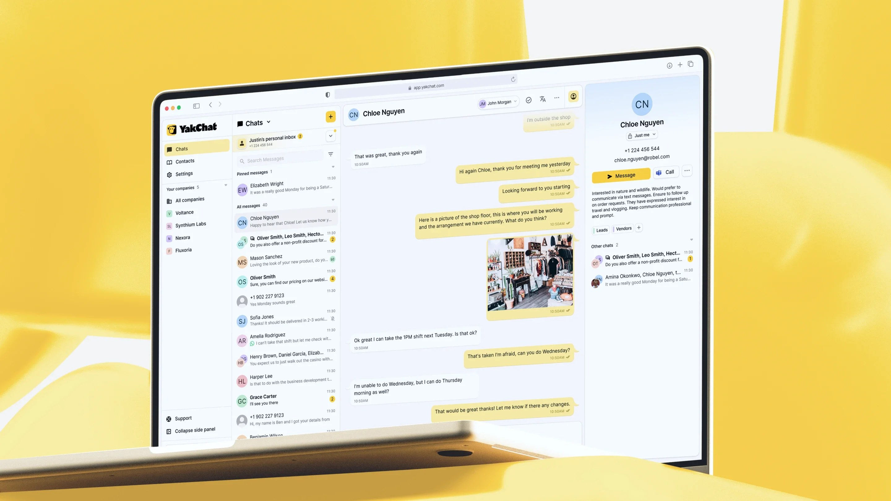 YakChat desktop messaging interface shown on laptop