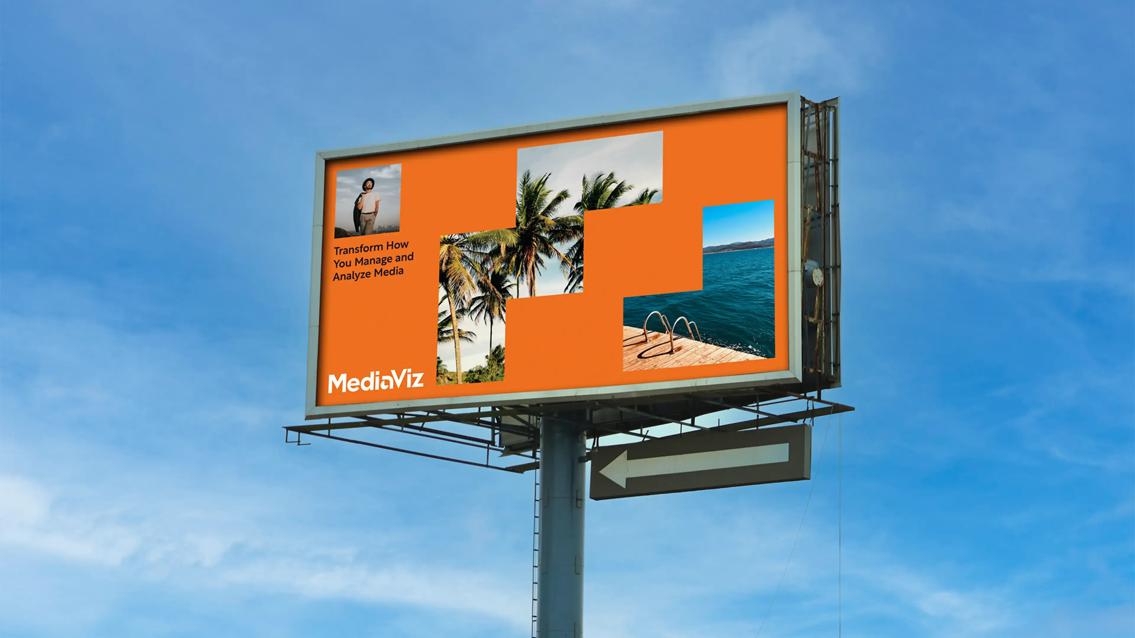 The MediaViz brand system applied at scale on a billboard, showing how a system extends beyond a logo.